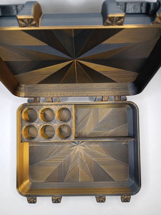 Open hard case showing a fitted insert with round cradles and a compartment