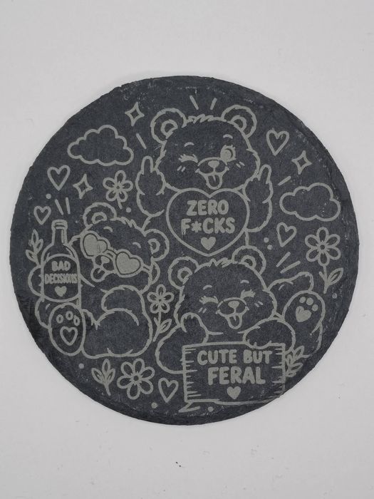 Round slate coaster: cartoon bears with a Zero F*cks heart and a Cute But Feral sign