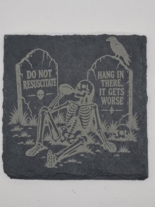 Square slate coaster: skeleton drinking between tombstones reading Do Not Resuscitate and Hang In There, It Gets Worse