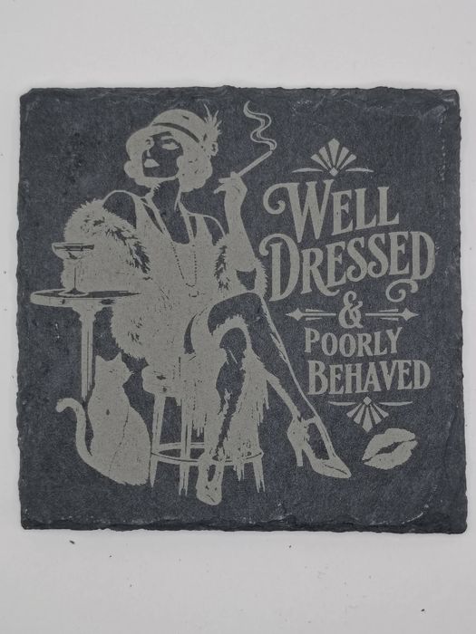Square slate coaster: 1920s flapper with a cigarette holder and cat, titled Well Dressed and Poorly Behaved